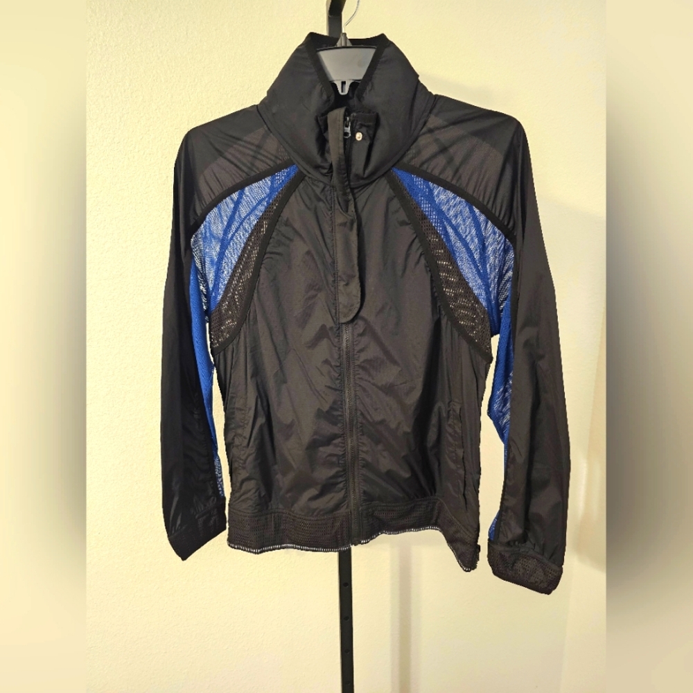NWOT. Free People Movement Black and Blue Jacket Sz Medium
